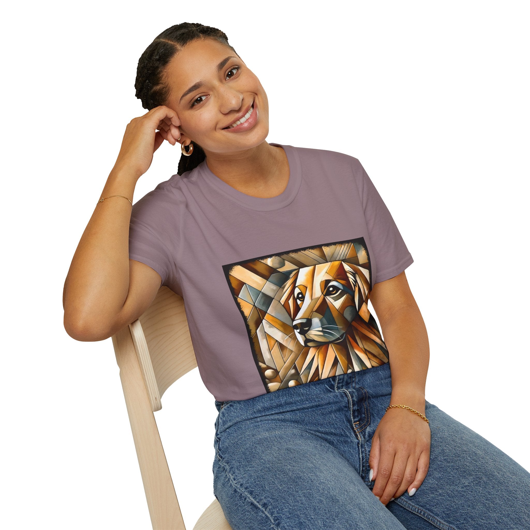 Female sitting in mauve dog t-shirt featuring golden retriever in geometric cubist style with warm amber and tan tones.
