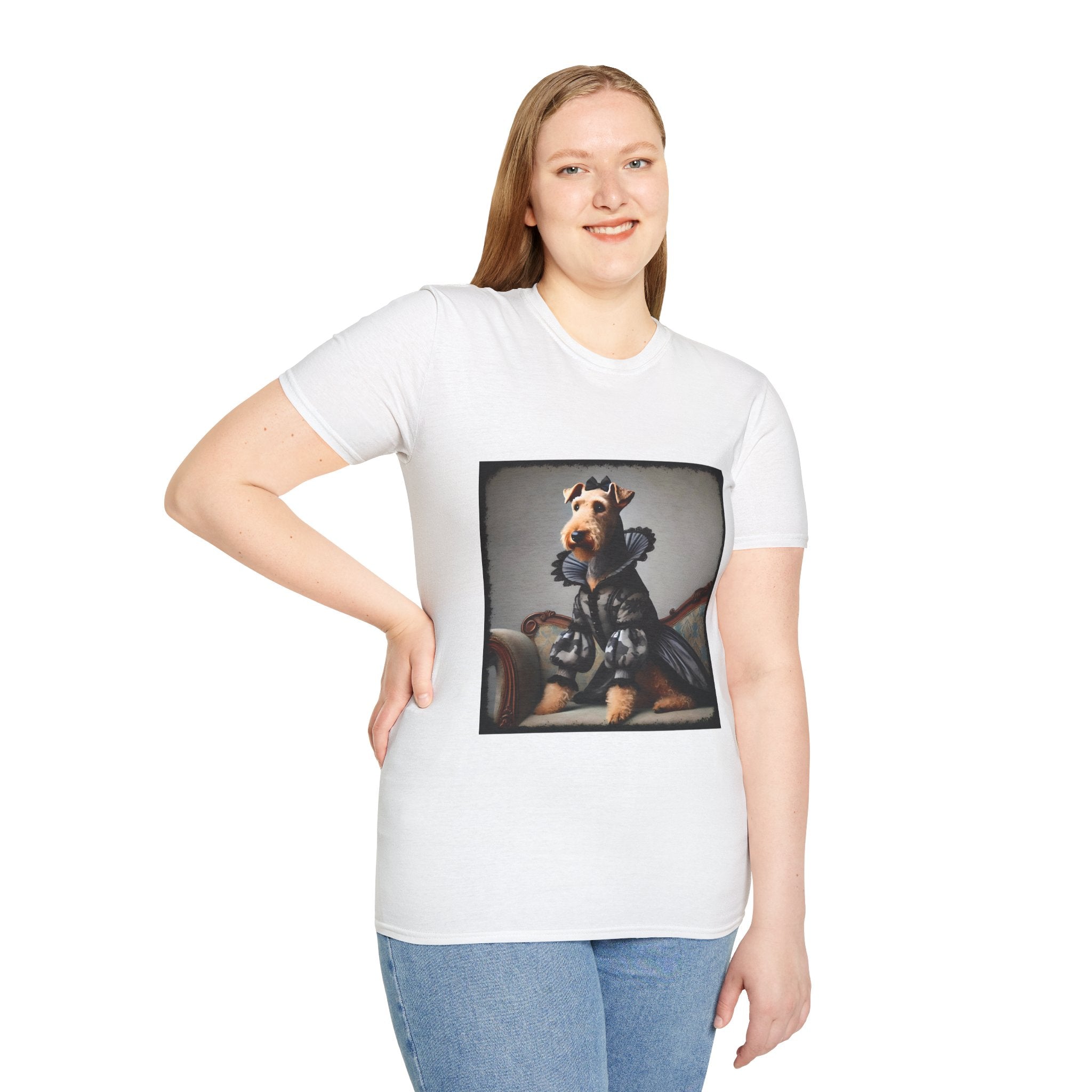 Female model in white dog t-shirt featuring Airedale terrier in camouflage Renaissance gown seated on settee.