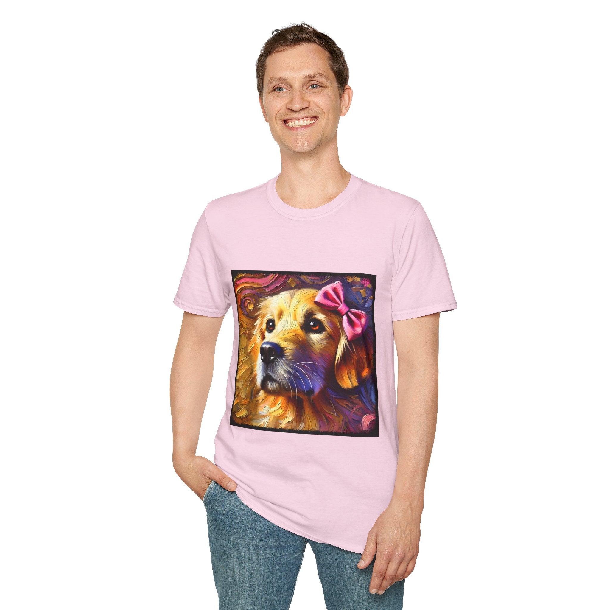 Male model in light pink dog t-shirt featuring golden retriever with pink bow on head, set against vivid painterly swirls.