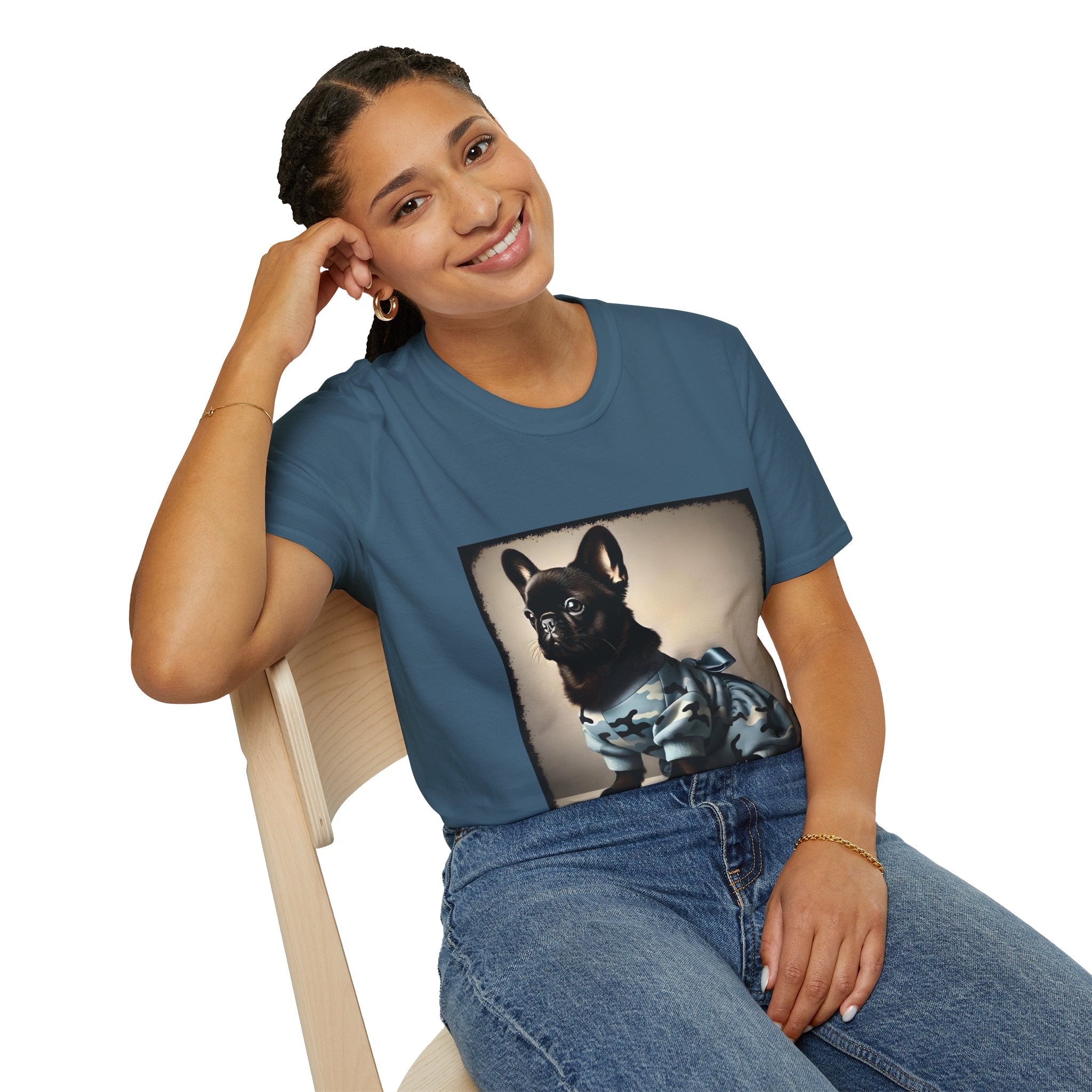  Woman sitting wearing indigo blue dog t-shirt featuring black French Bulldog in blue camo outfit with bow, set in soft vintage portrait.