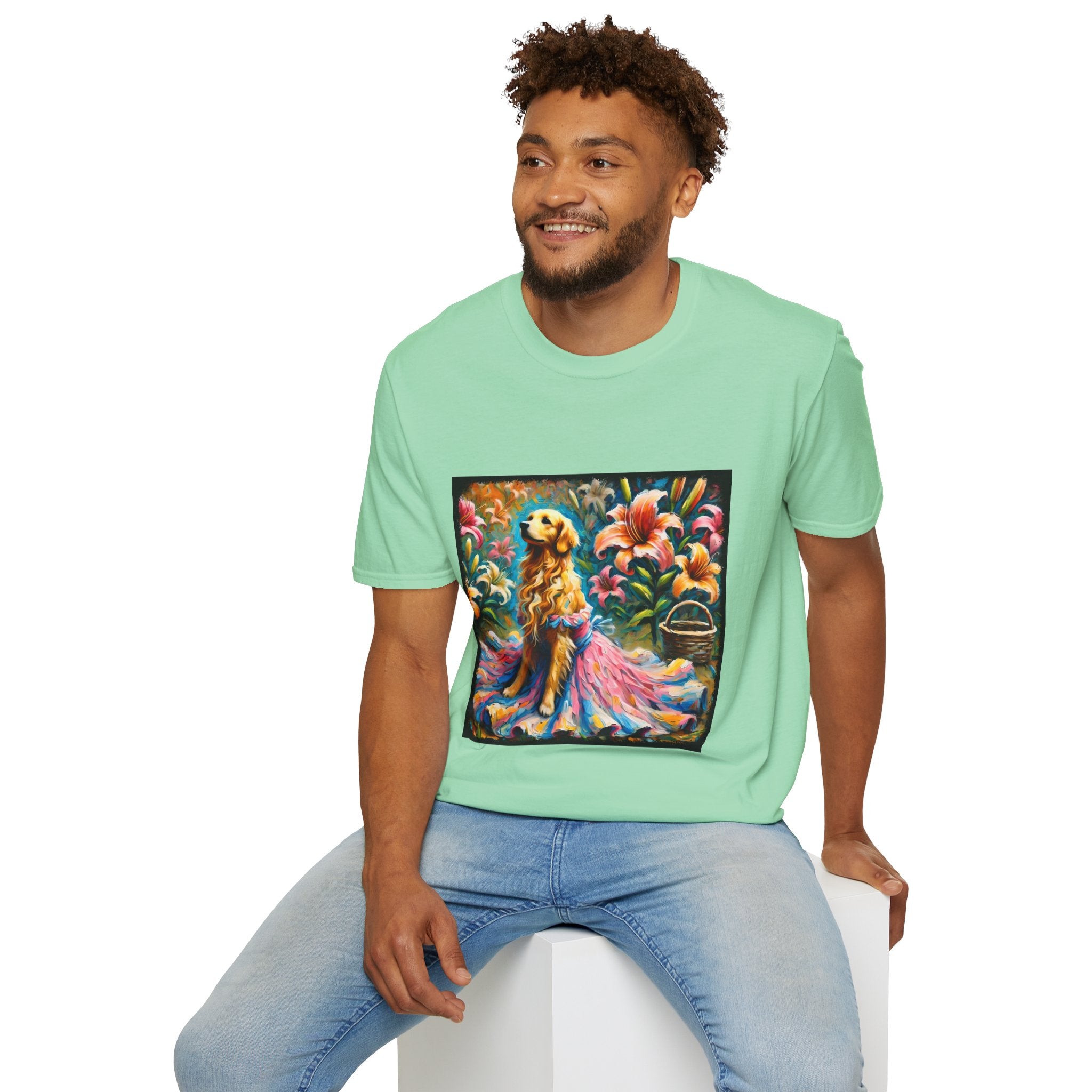 Male model in mint green dog t-shirt featuring golden retriever in pink-and-purple gown surrounded by vibrant tropical flowers.