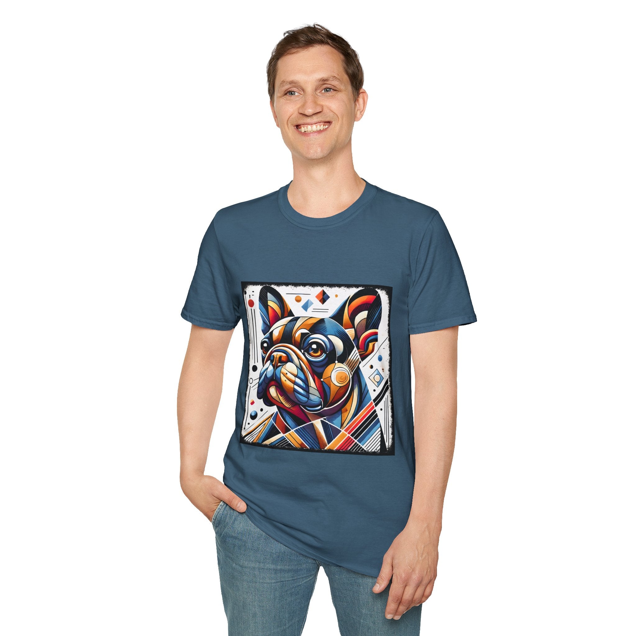 Male smiling in indigo blue dog t-shirt featuring geometric-style French Bulldog in vivid orange, blue, and red against a white abstract background.