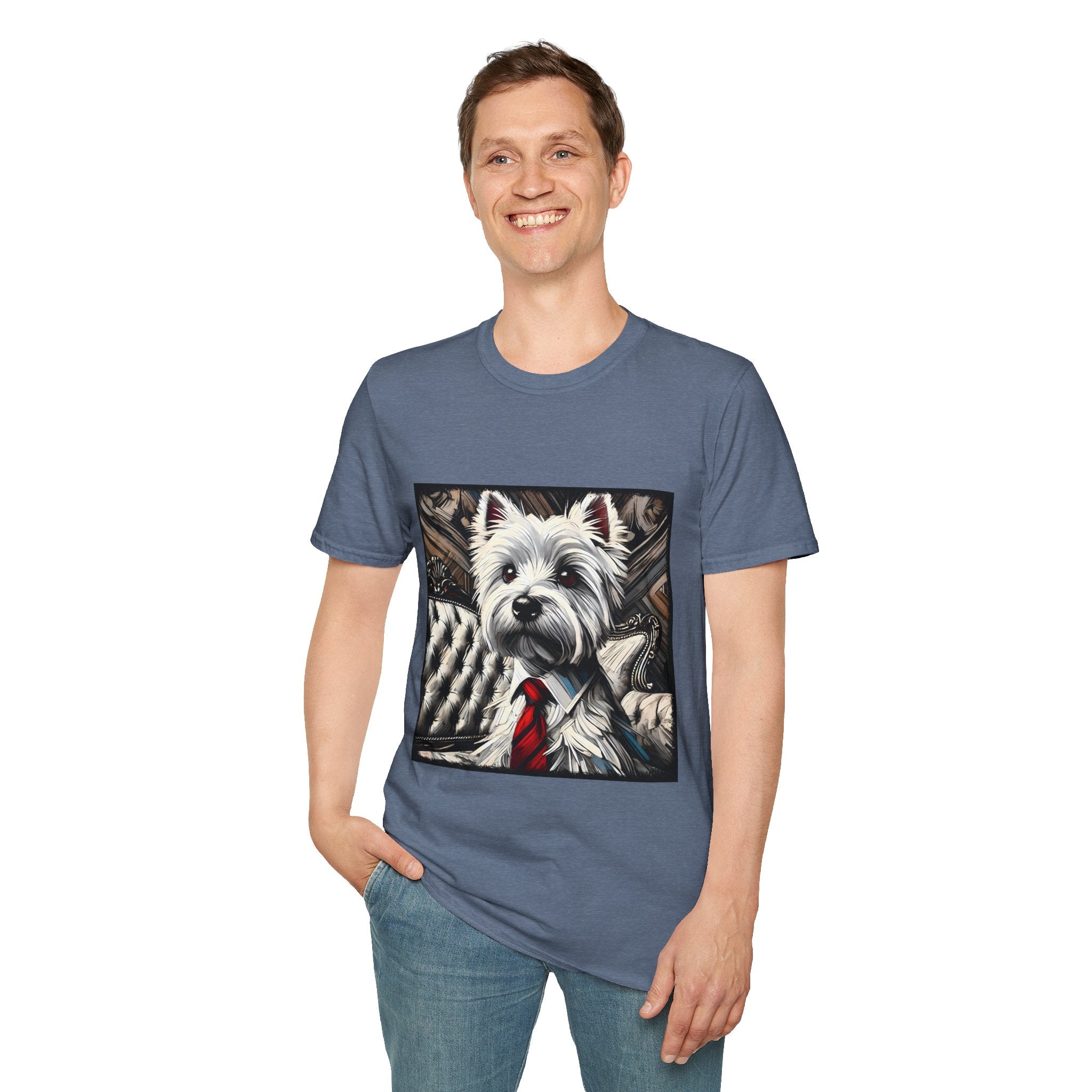 Male model in heather indigo dog t-shirt featuring a Westie in a red tie seated on a tufted chair in a wood-accent room.