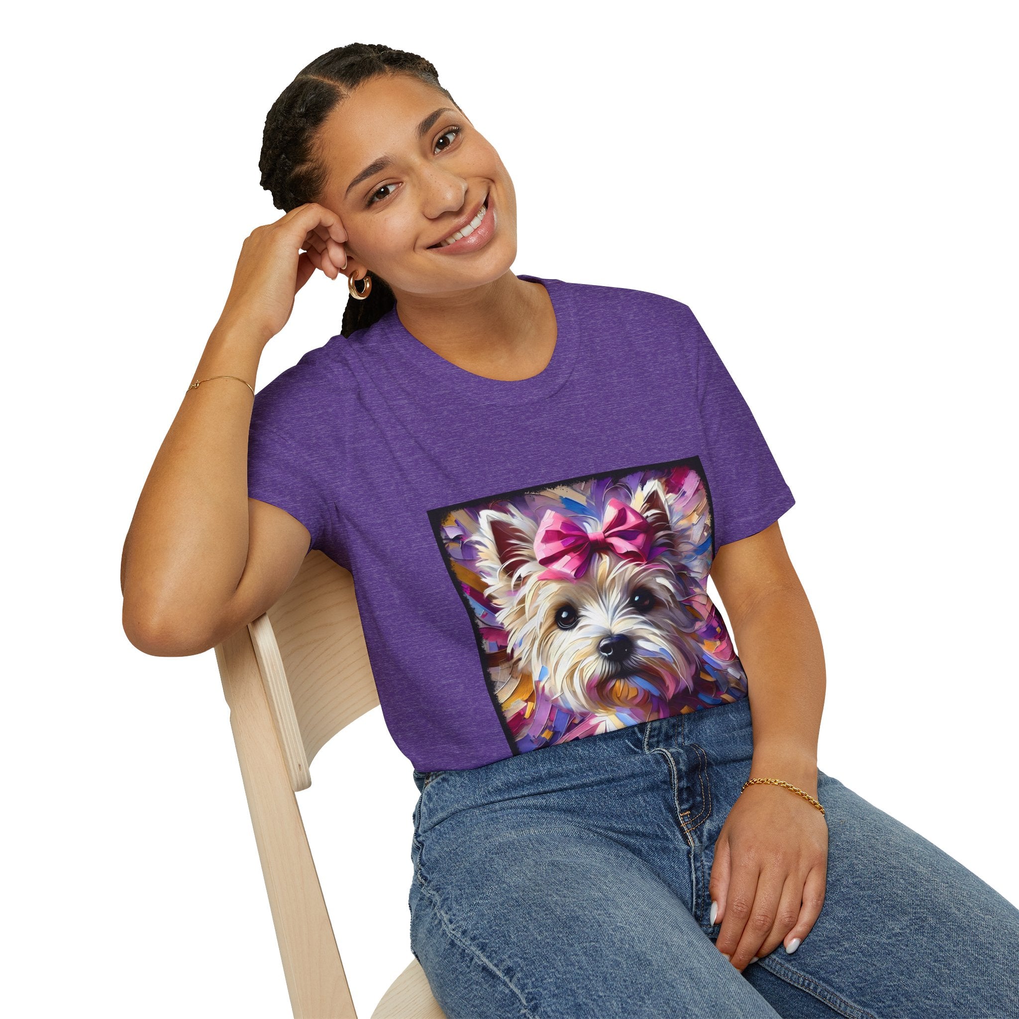 Female model in heather purple dog t-shirt with Westie face, pink bow, and bold brushstroke colors in purple, pink, and gold.