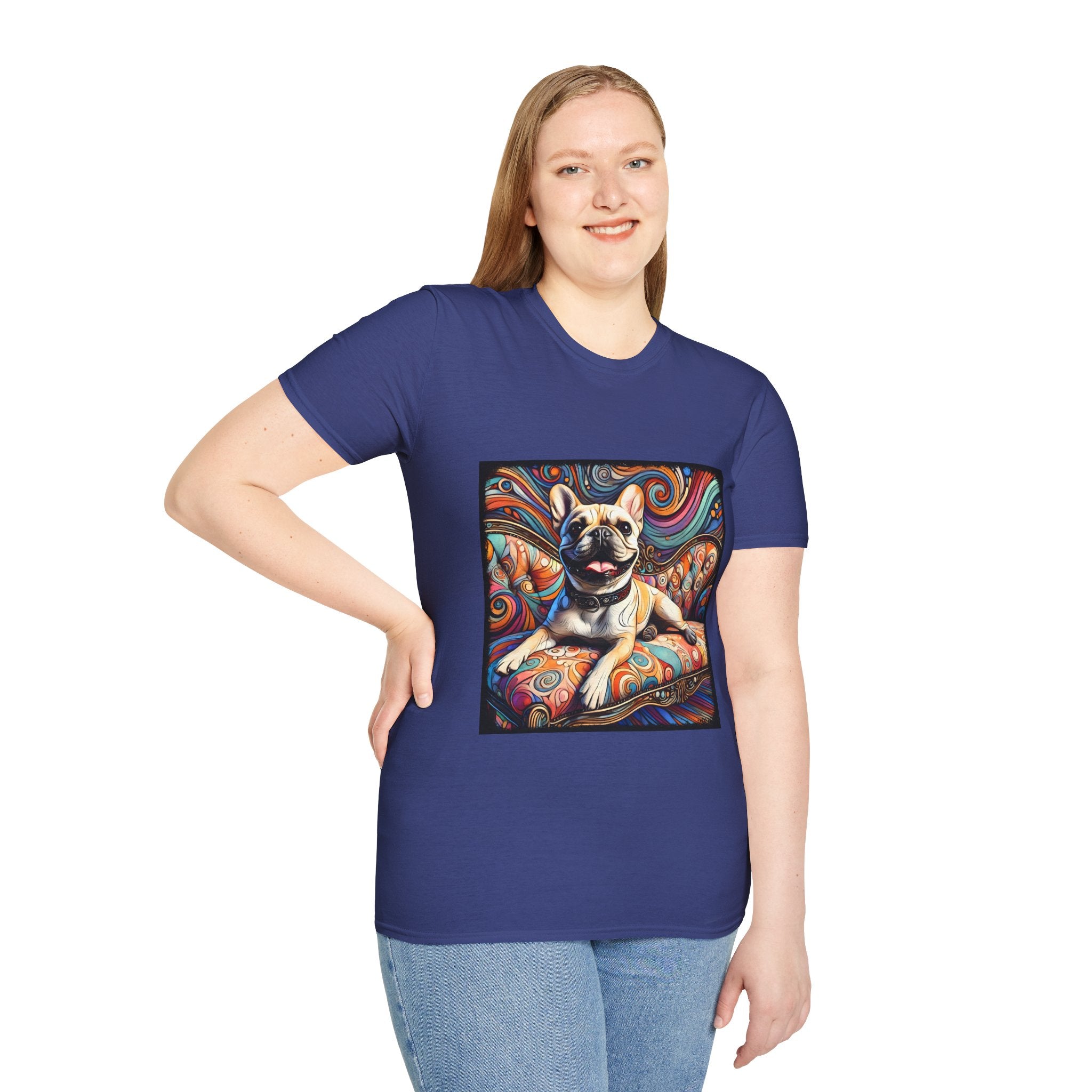 Female model in royal blue dog t-shirt featuring fawn French Bulldog lounging on swirl settee with vivid colorful background.