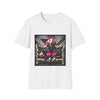 White dog t-shirt featuring golden retriever with pink bow and fur outfit on black settee in edgy backdrop.