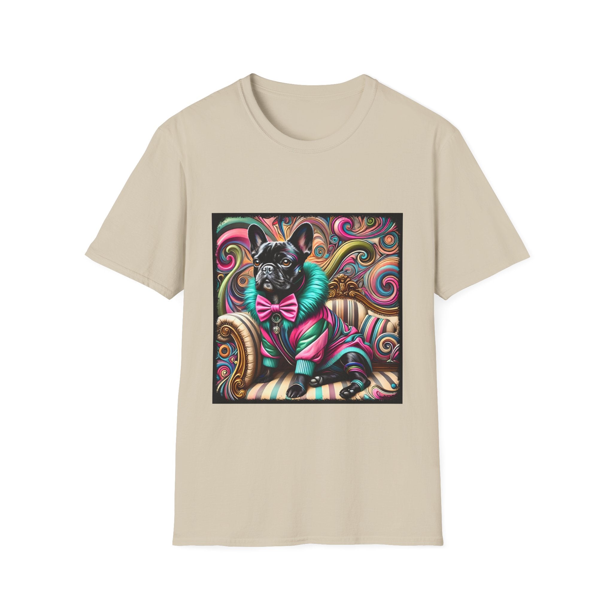 Dog t-shirt in beige featuring black French Bulldog in pink and teal outfit on ornate striped settee with swirl background.