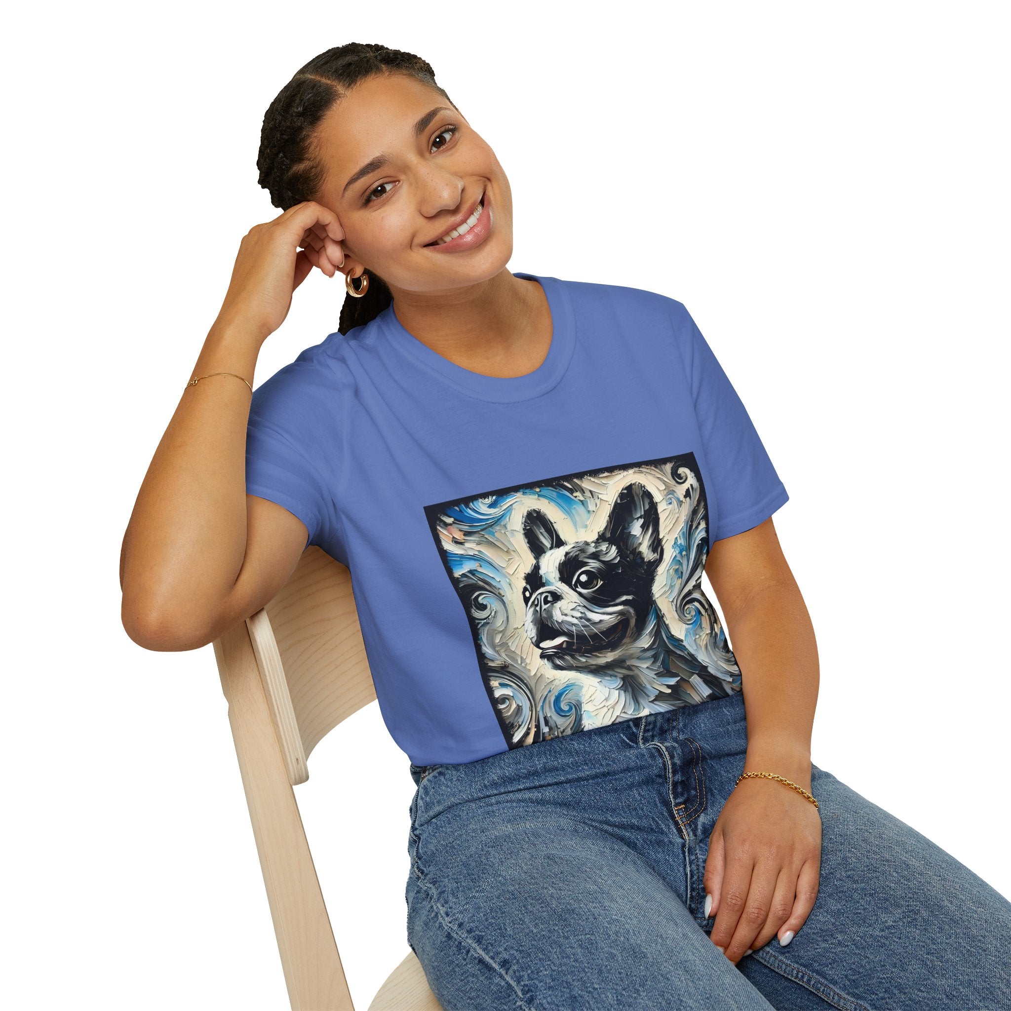 Woman sitting indigo blue dog t-shirt featuring black and white French Bulldog portrait on swirl-patterned background.