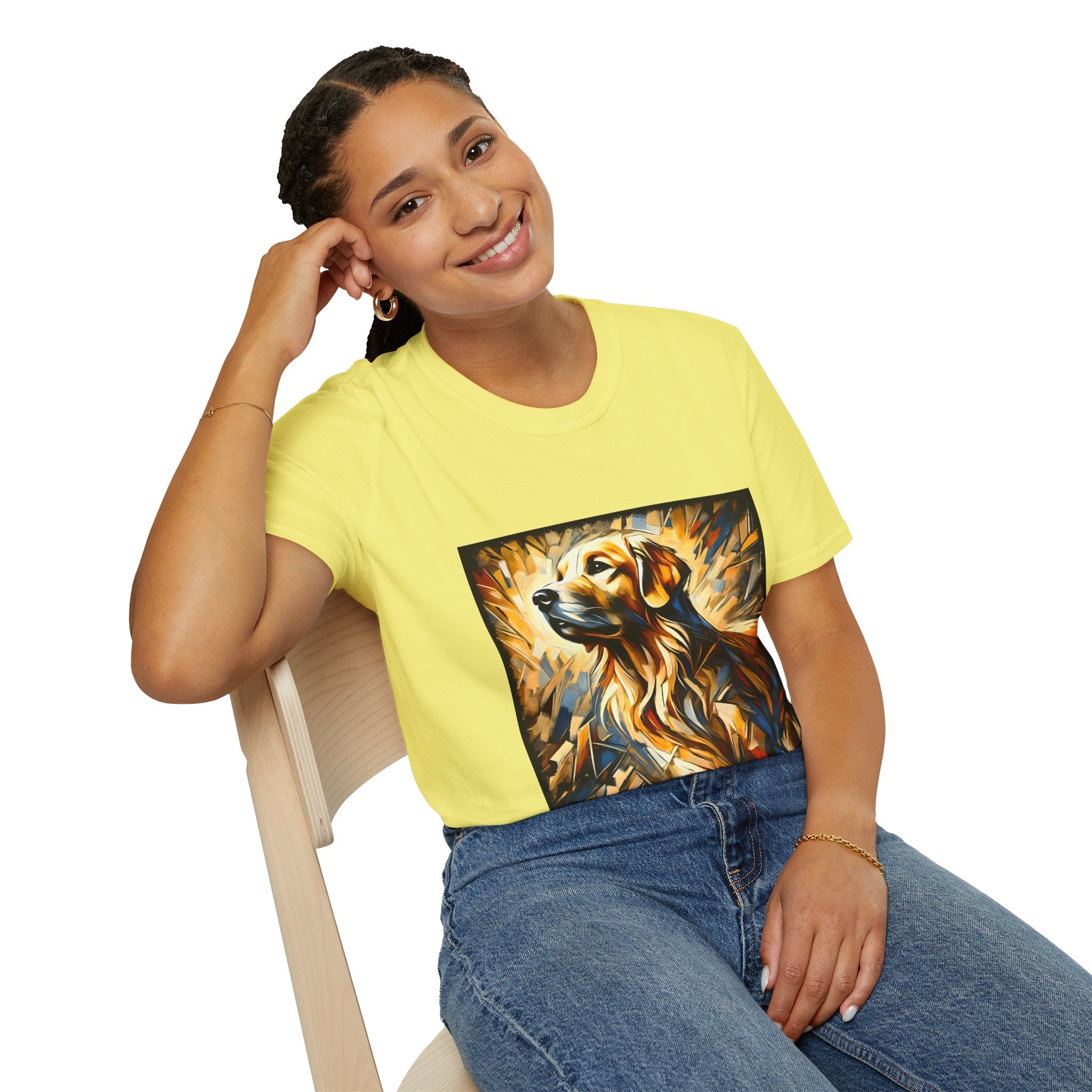 Female sitting in cornsilk yellow dog t-shirt featuring golden retriever portrait with fiery gold, blue, and amber abstract swirls.