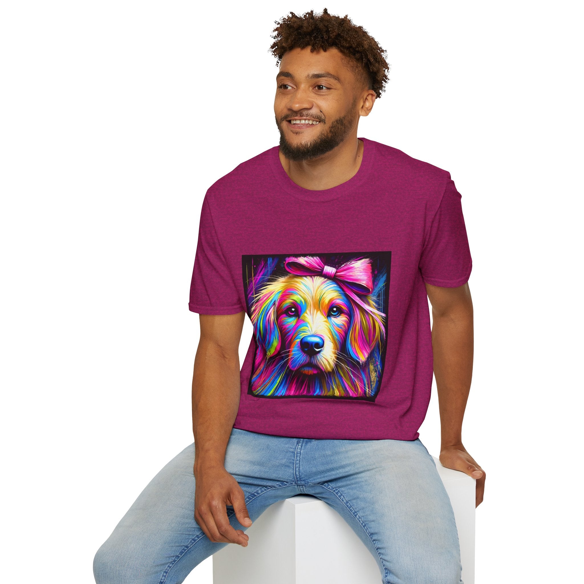 Male model in heather berry dog t-shirt featuring neon-colored golden retriever with pink bow on vibrant electric abstract backdrop.