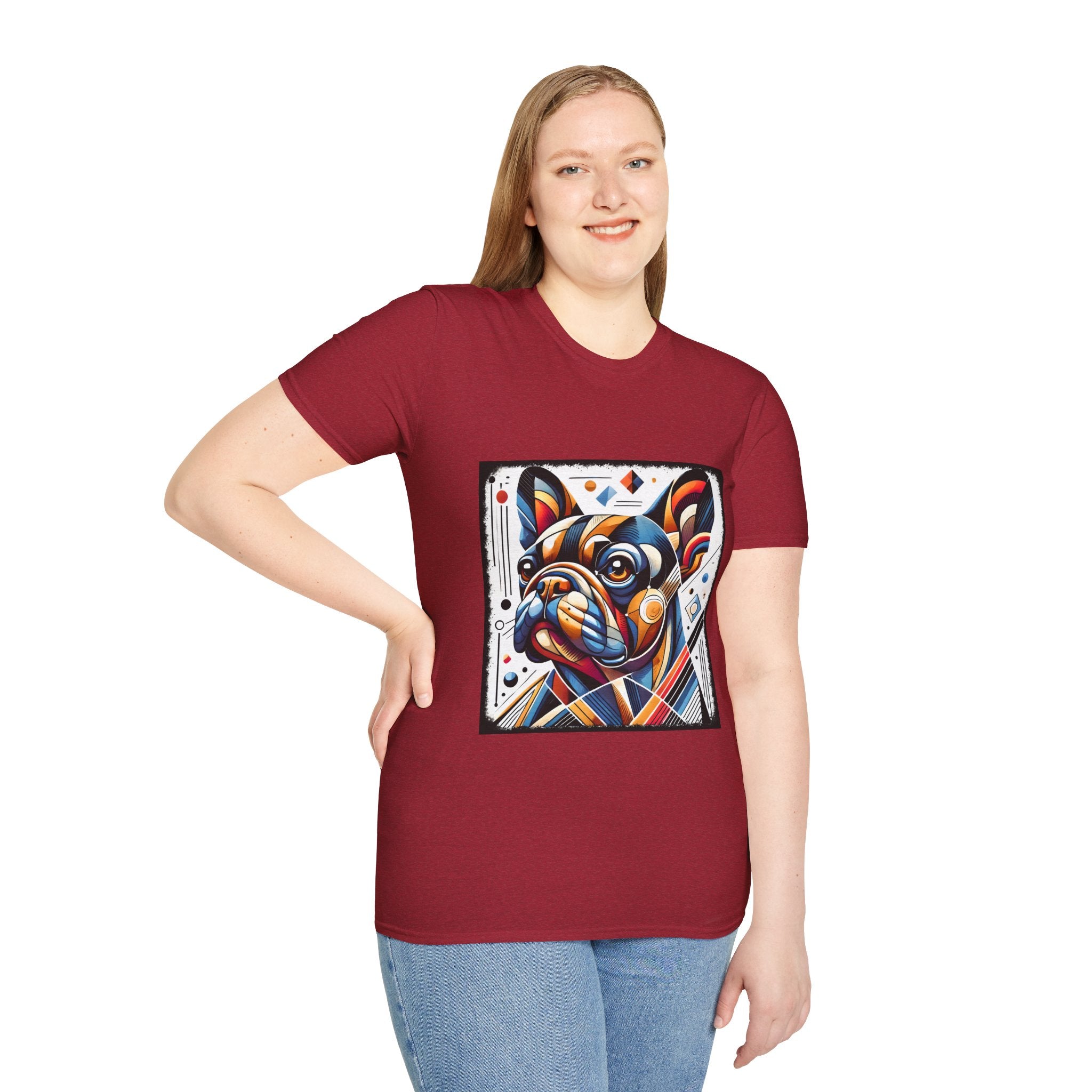 Female smiling in antique cherry red dog t-shirt featuring geometric-style French Bulldog in vivid orange, blue, and red against a white abstract background.