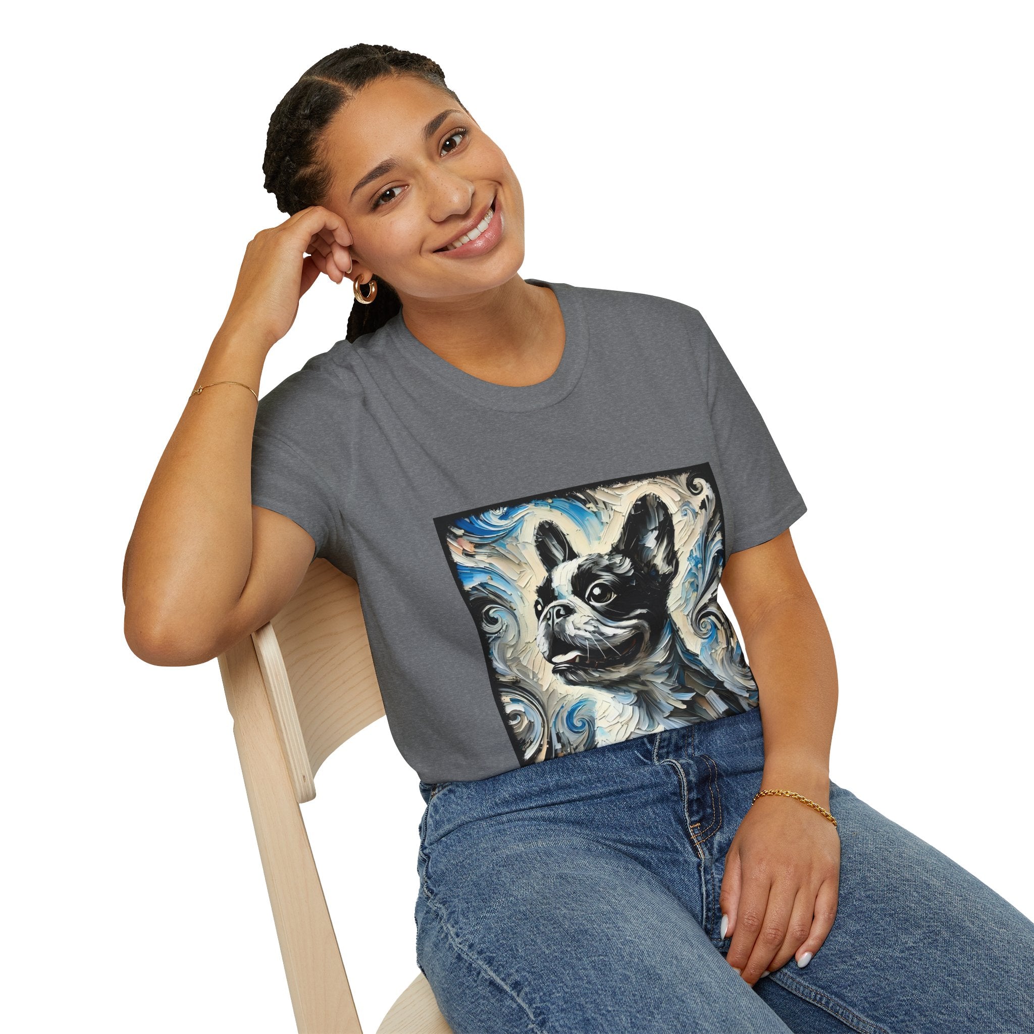 Woman sitting in graphite heather dog t-shirt featuring black and white French Bulldog portrait on swirl-patterned background.