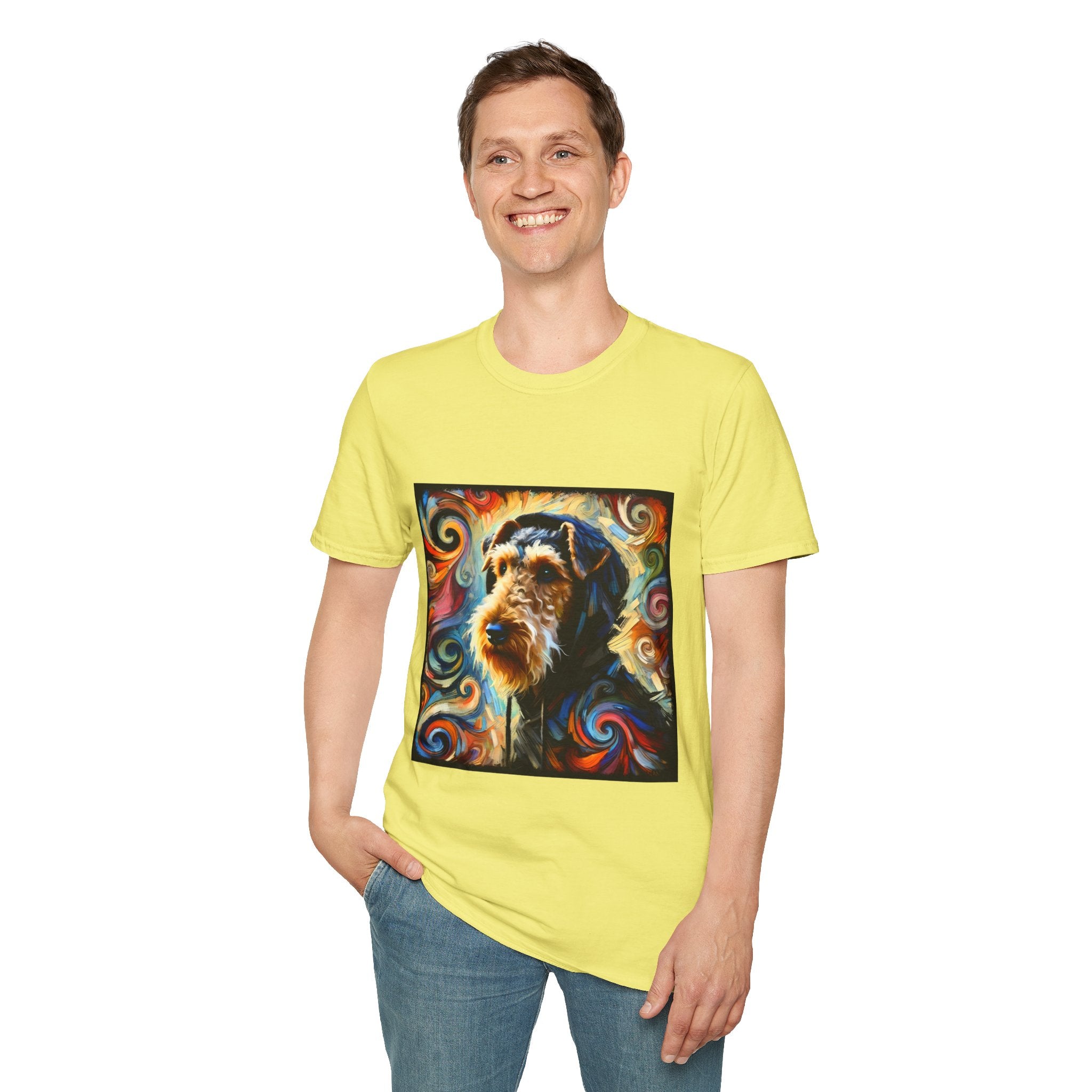 Male model in yellow dog t-shirt with Airedale terrier in hoodie and vibrant multicolor swirl background.