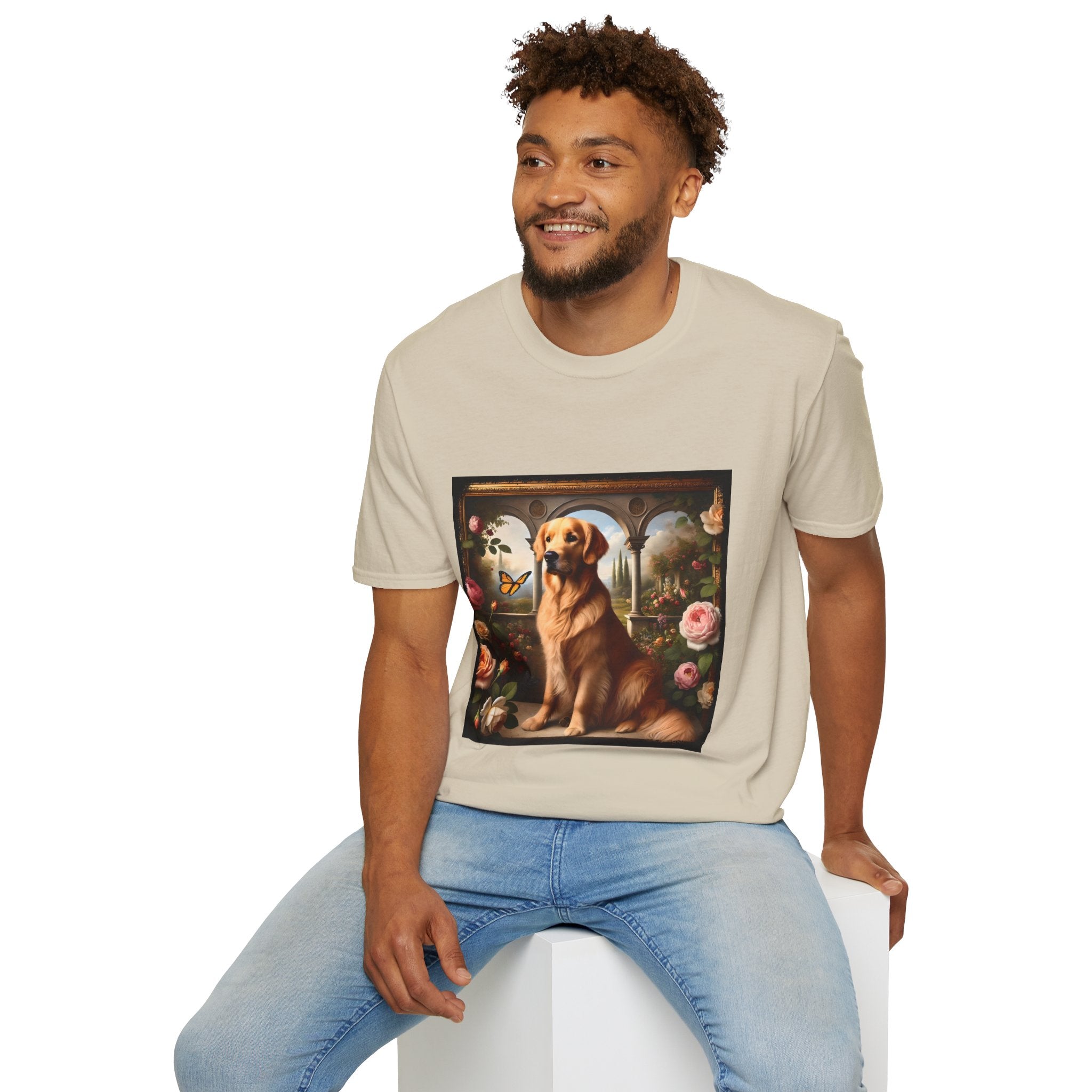Male model in sand dog t-shirt featuring golden retriever in garden scene with roses, archway, and butterfly.