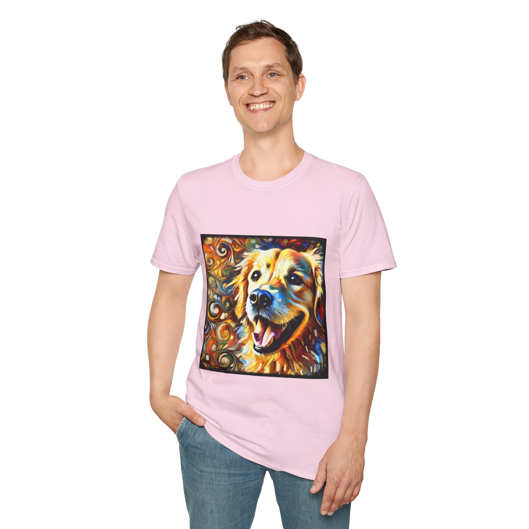 Male standing in light pink dog t-shirt featuring smiling golden retriever portrait with bold swirls in orange, gold, and blue.
