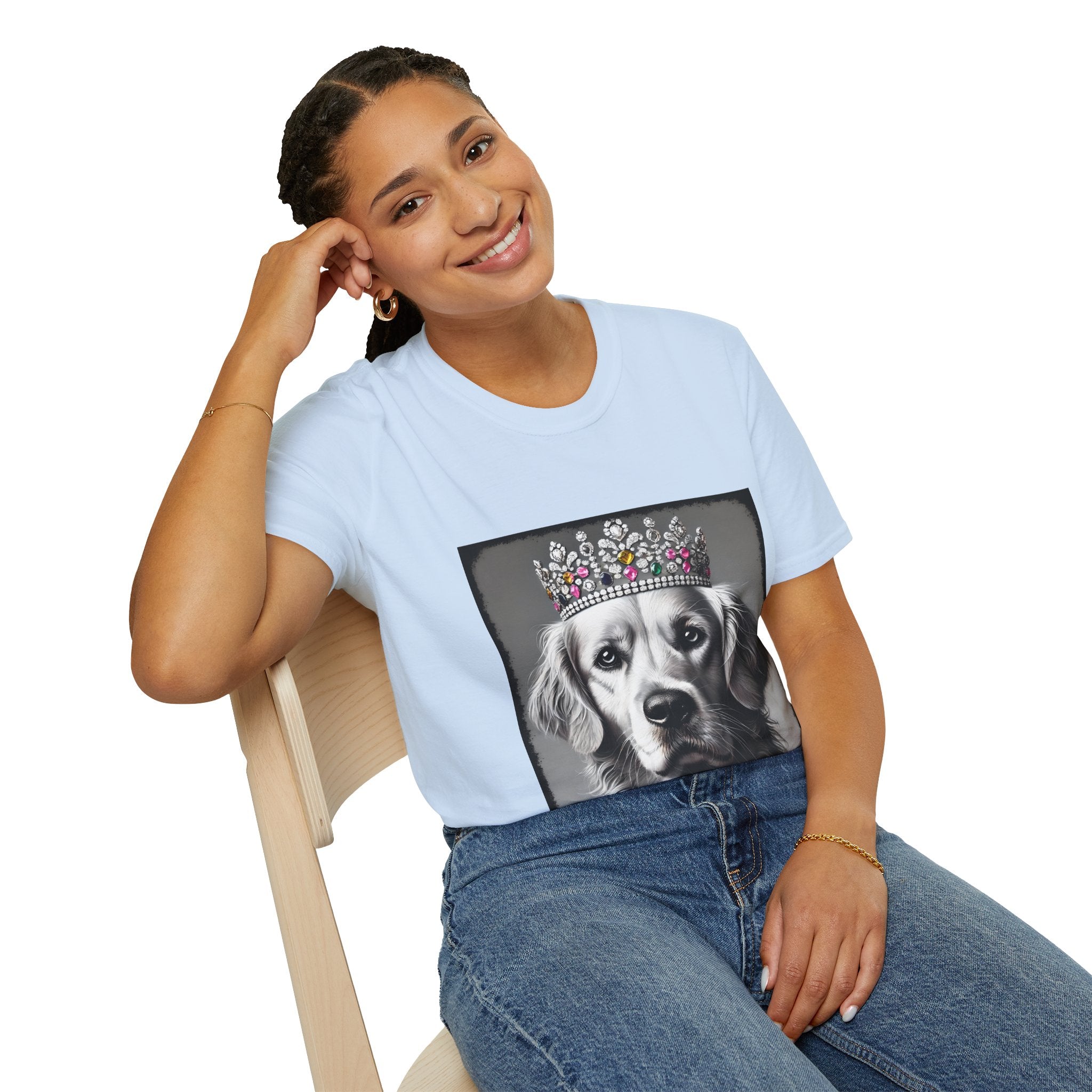 Female model wears light blue dog t-shirt featuring a black-and-white princess Golden Retriever with jeweled crown on gray background.