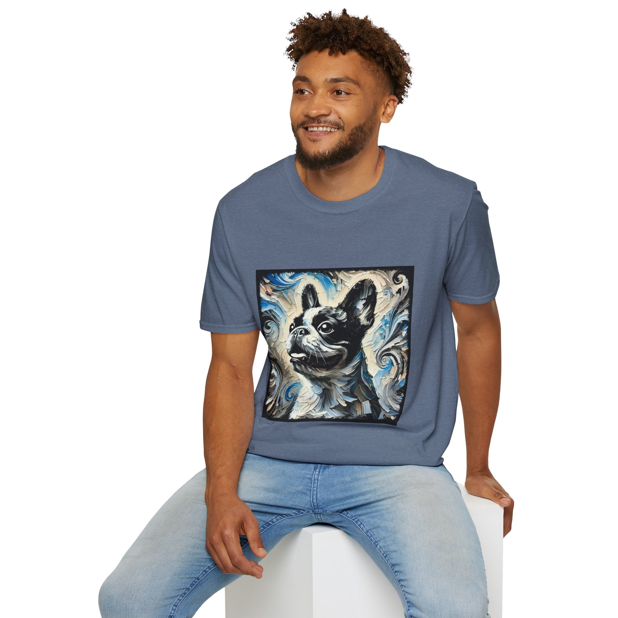 Male model wearing heather indigo dog t-shirt with black and white French Bulldog portrait on swirl-patterned vintage background.