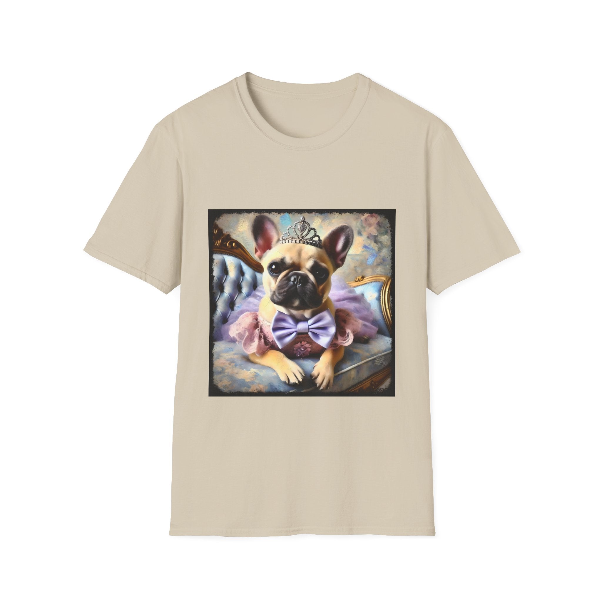 Beige dog t-shirt featuring French Bulldog wearing tiara, purple tutu, and bow, seated on royal chair with pastel background.