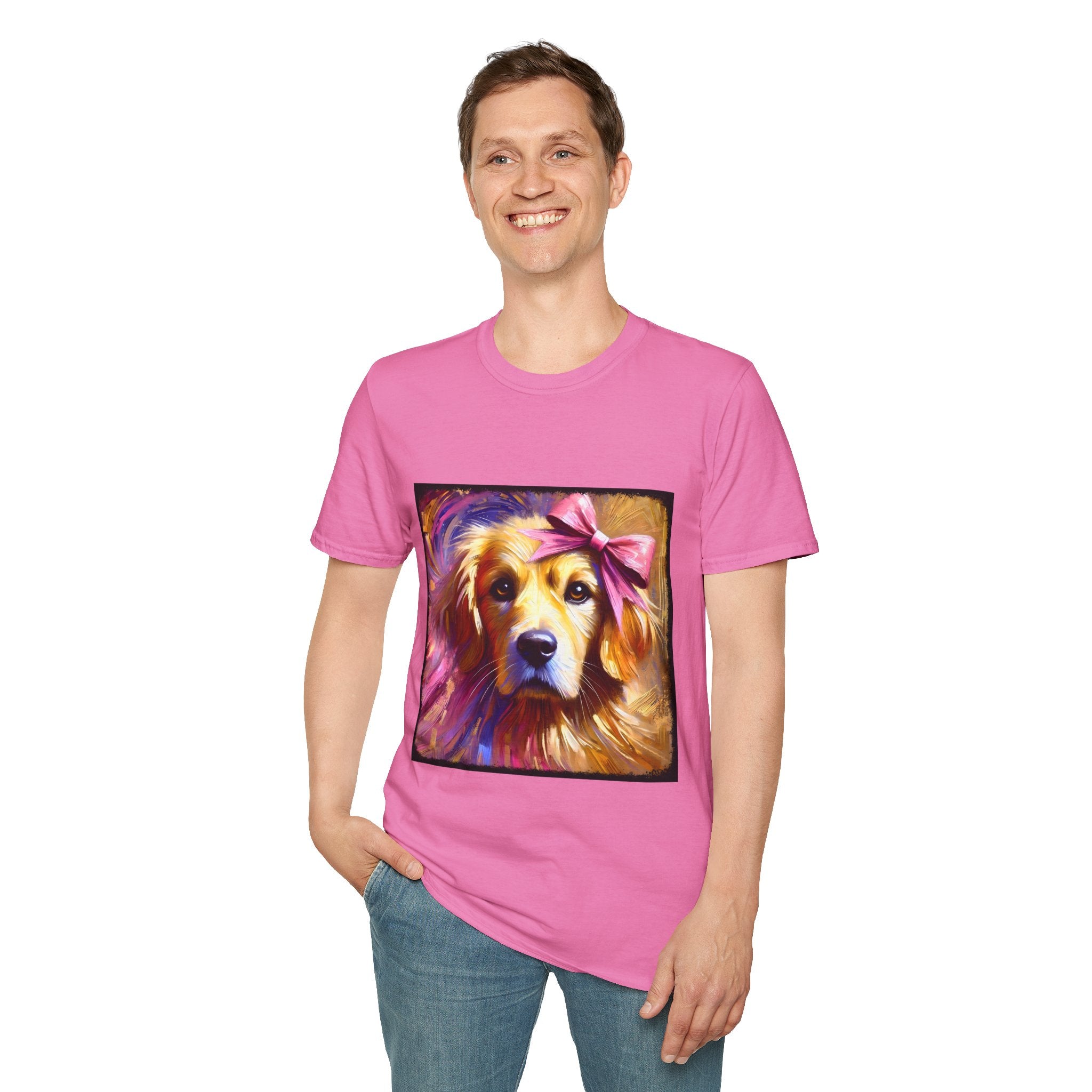 Male model in pink dog t-shirt featuring golden retriever with pink bow on head, bold brushstroke background in pinks.