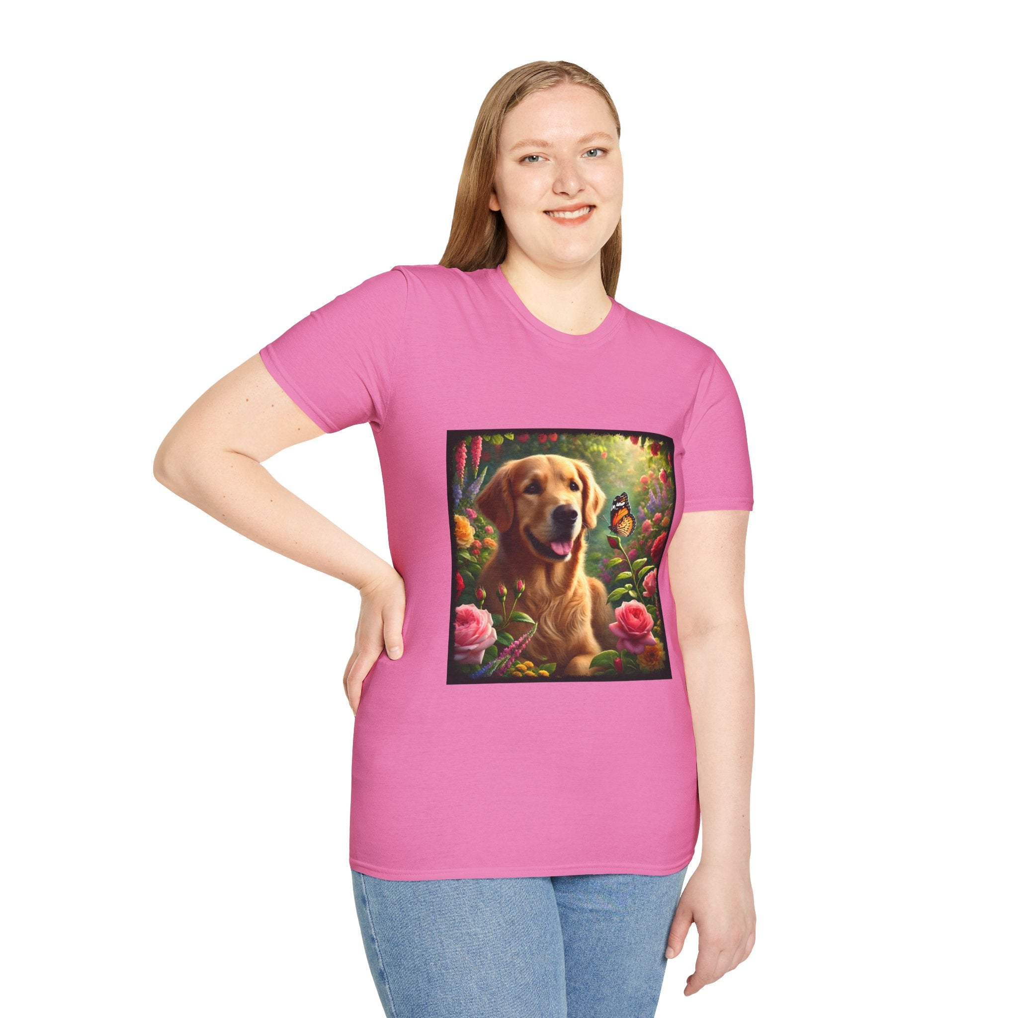 Female model wears pink dog t-shirt featuring a golden retriever in a vibrant garden with roses, wildflowers, and a butterfly.
