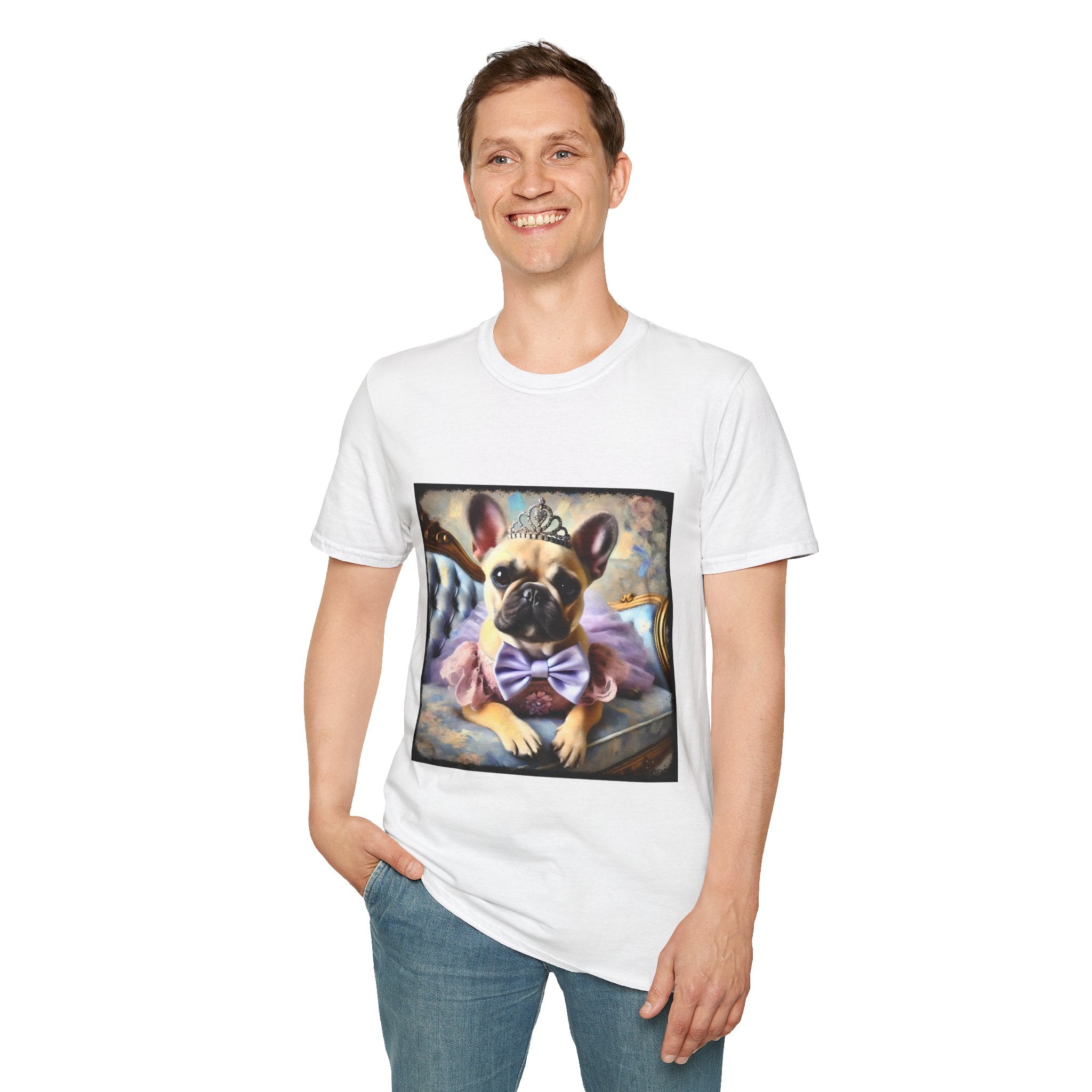 Man smiling in white dog t-shirt featuring French Bulldog in tiara and tutu on royal chair with dreamy pastel background.
